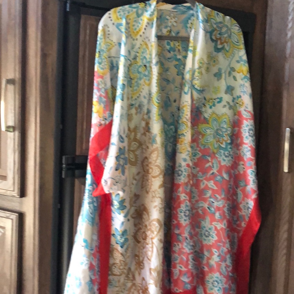 Coverup with flower print. Like new.  No tags.